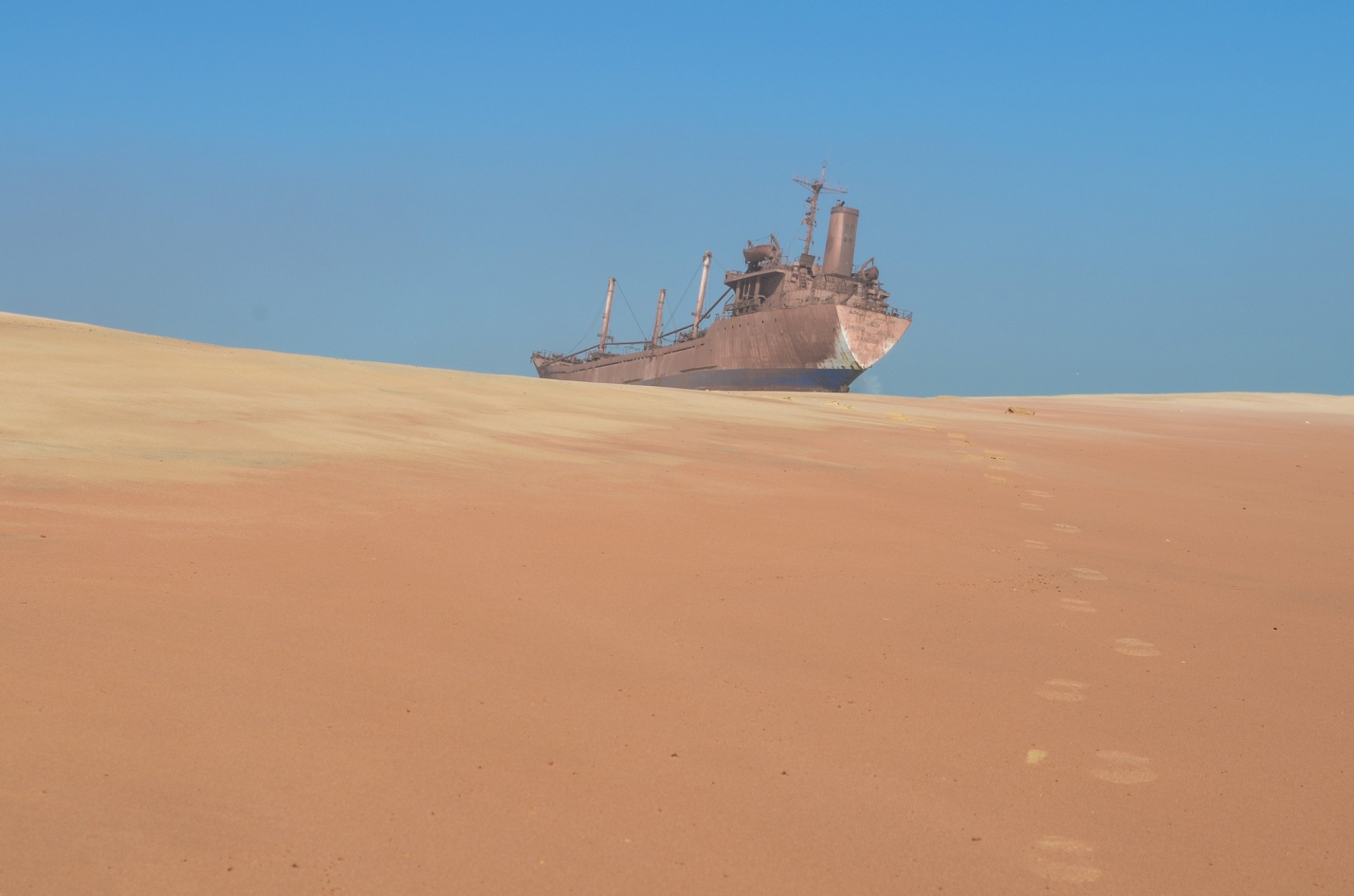 Shipwreck of the United Malika in Cap Blanc, Mauritania. CC photo by Jbdodane.
