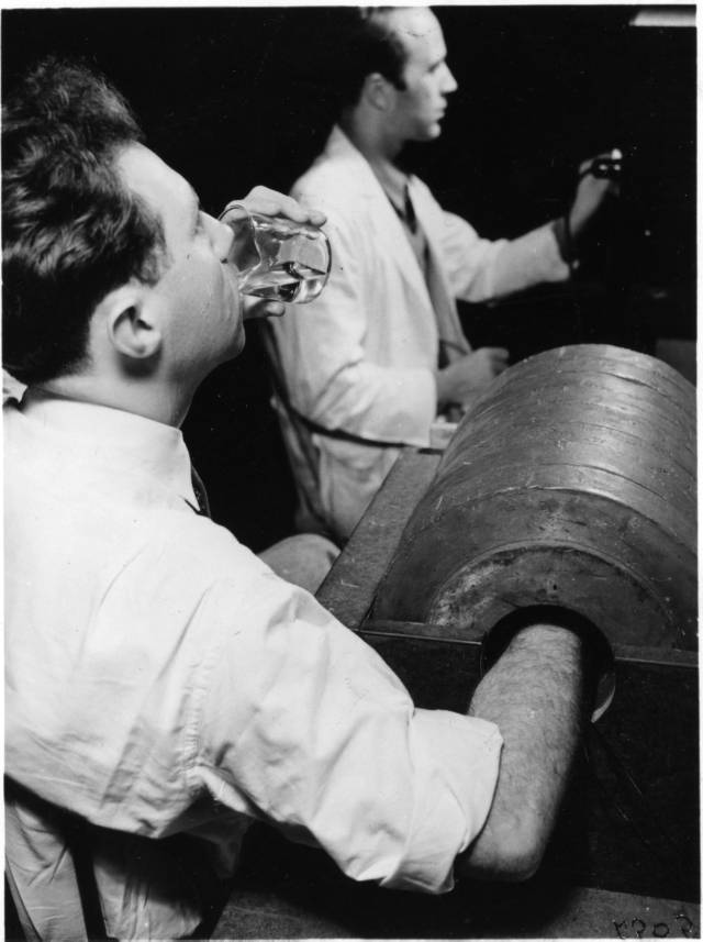 Joseph Hamilton drinking radiosodium. Public Domain photo.