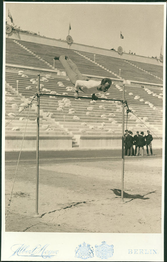 Olympic Games, 1896; the athlete Herman Weingartner, horizontal bar champion. Public domain photo by Albert Meyer. 
